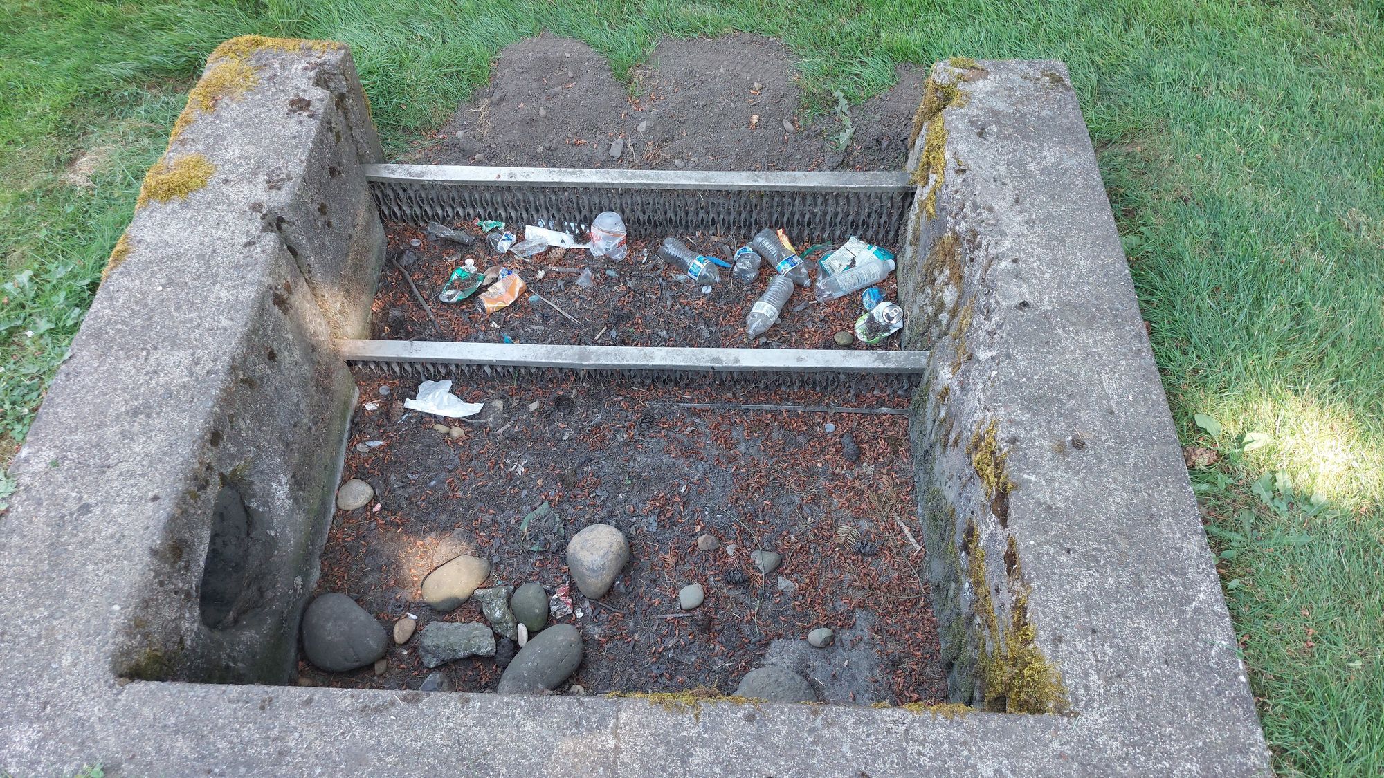 Before maintenance condition of a heavily clogged trash rack